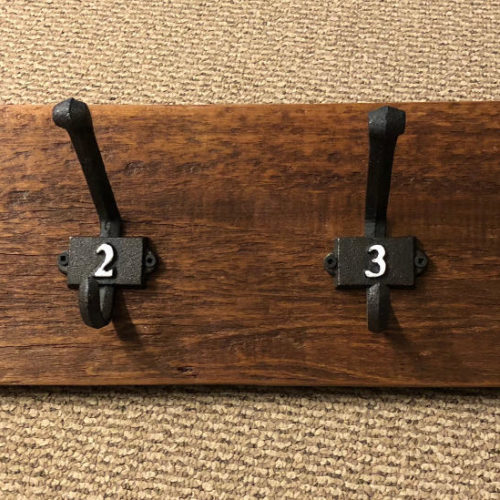 Hookboard with Cast Iron Number Hooks on Reclaimed Board
