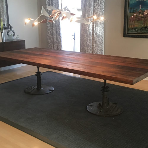 Dining Table in Reclaimed Antique Heart Pine with Vintage Cast Iron Industrial Bases