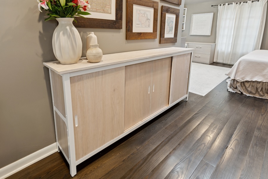 white storage cabinet with sliding doors