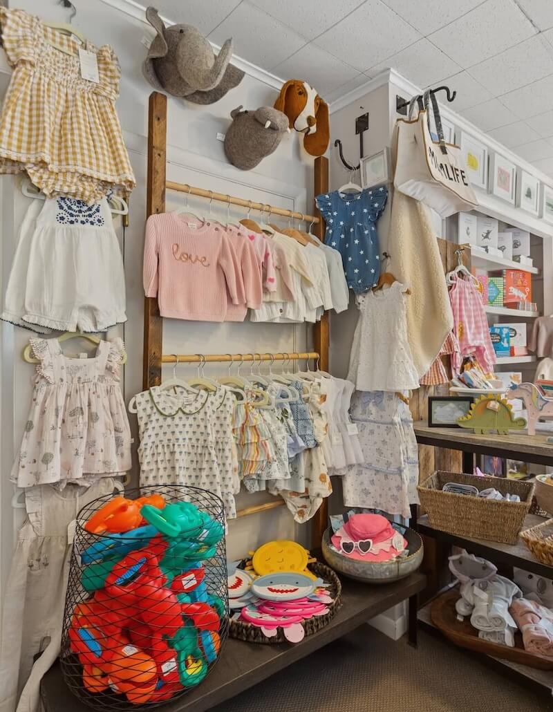 baby clothes, toys, books, and decor