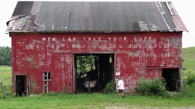 Old red barn falling apart