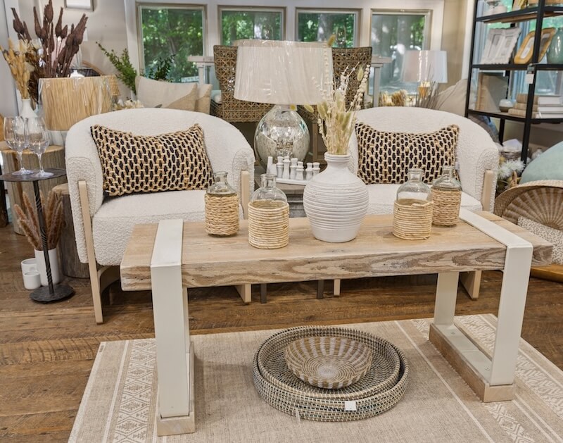 Cozy white chairs with custom coffee table