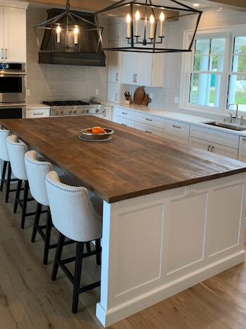 Wood countertop on island in kitchen